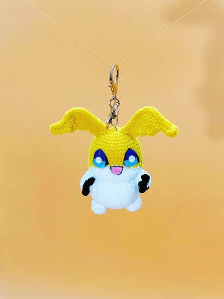 Yellow winged monster handmade crochet keychain