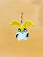 Yellow winged monster handmade crochet keychain