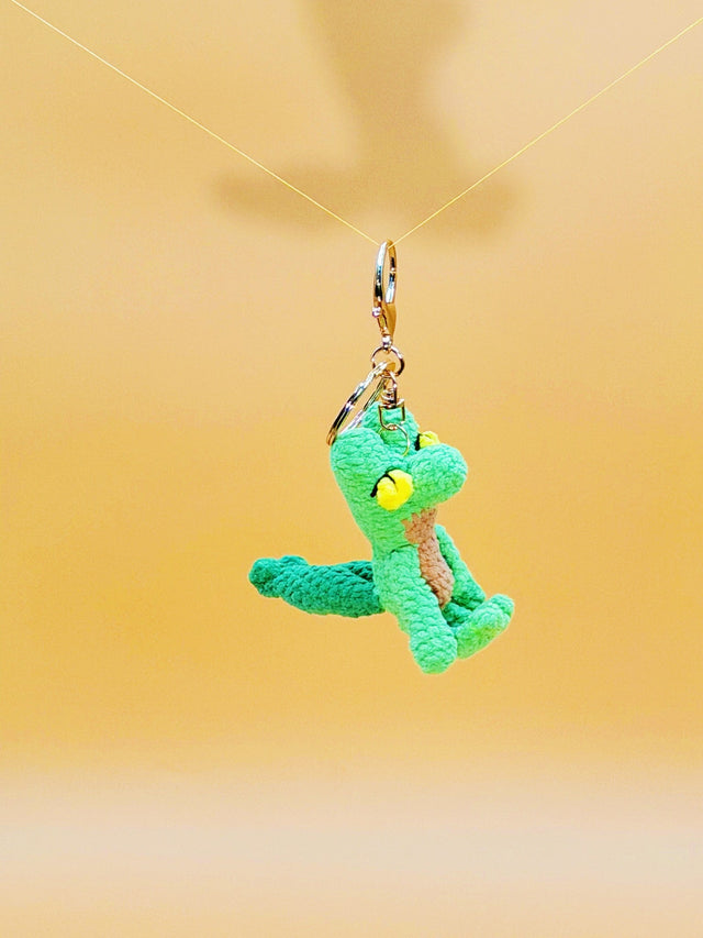 Green gecko handmade crochet keychain side view